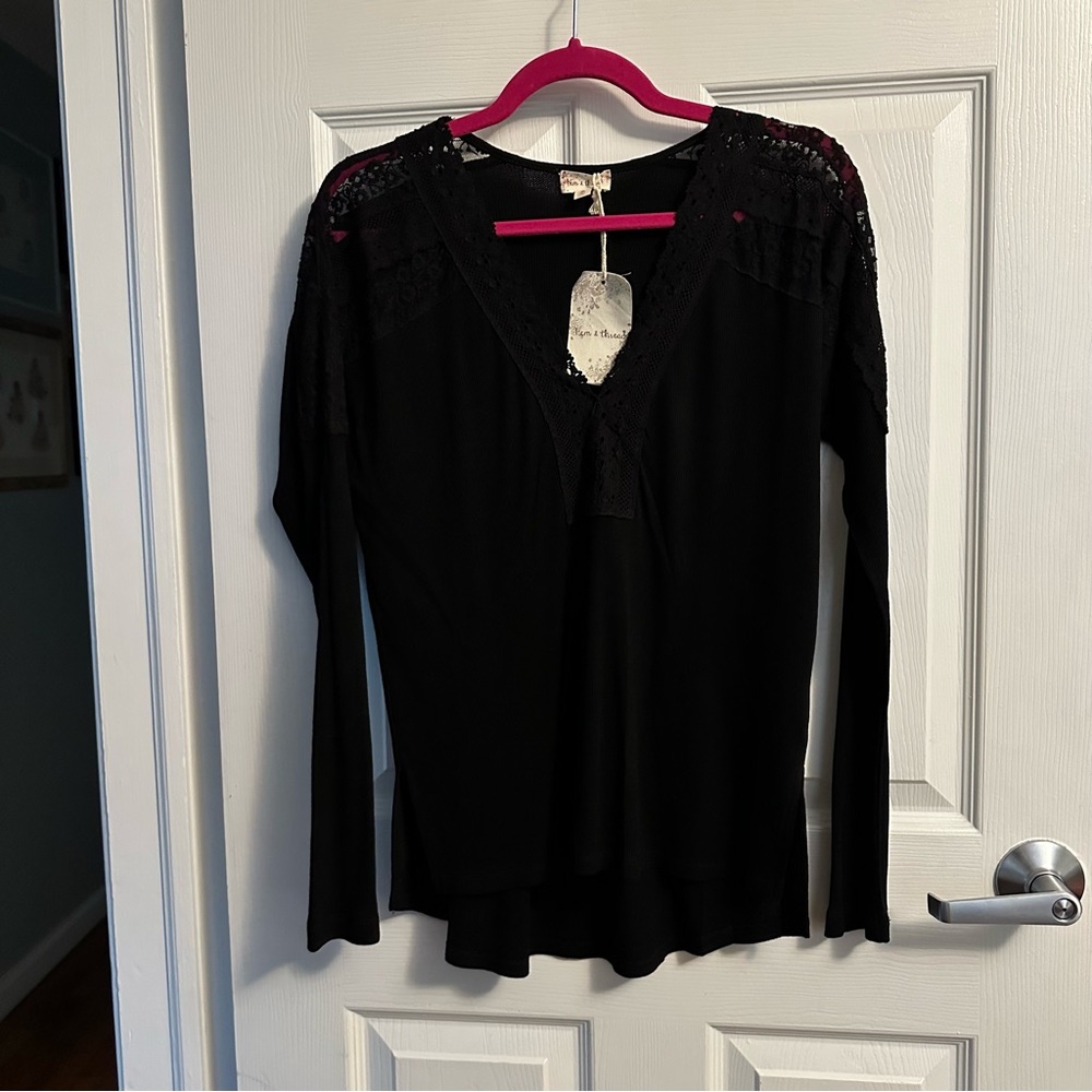 NWT Women’s black  top with lace on shoulders & partial sleeves.